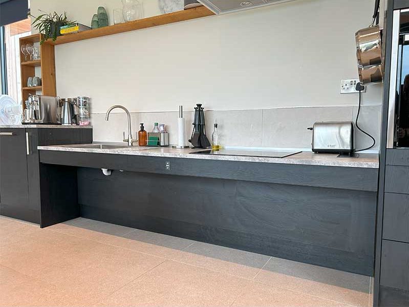 `Black accessible kitchen adjustable worktop`