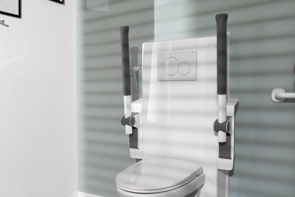 Ropox toilet lifter with support arms in raised position on wall-hung toilet