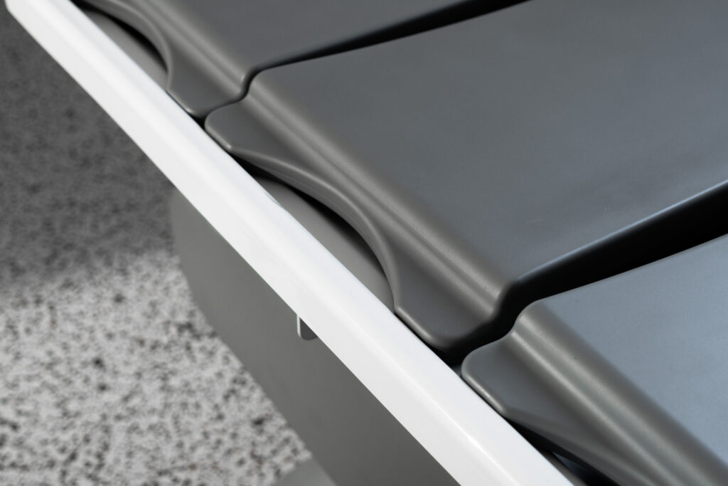 Close-up of the soft padded slats on an accessible shower stretcher by Ropox