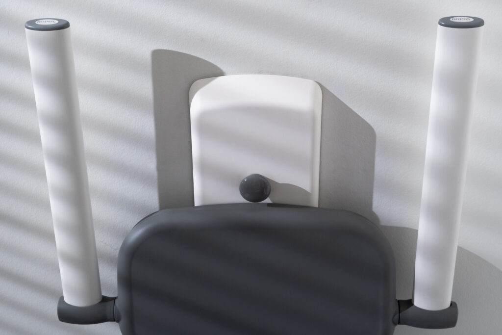 Top view of shower seat with backrest and Ropox grab rails on each side