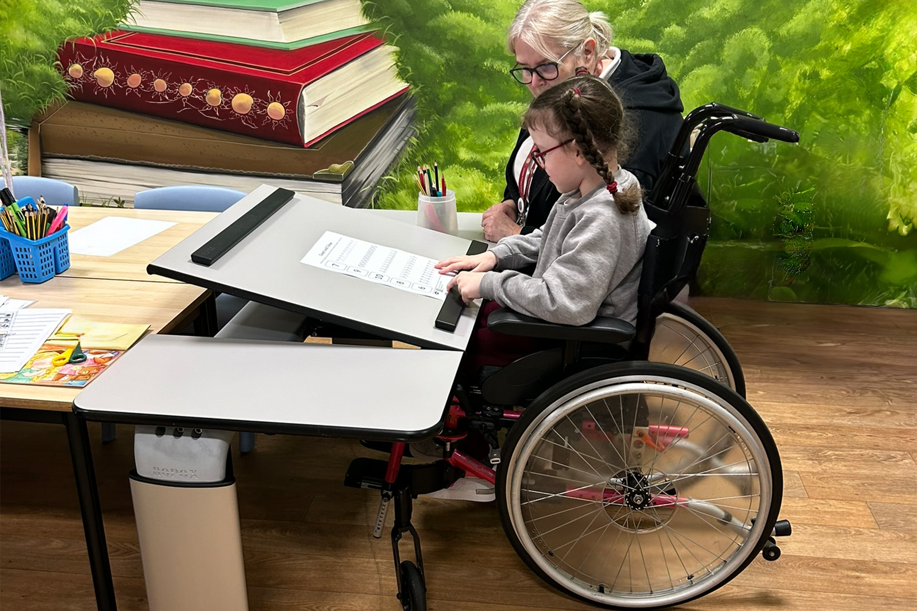 girl in a wheelchair using an adjustable Ropox Vision Table