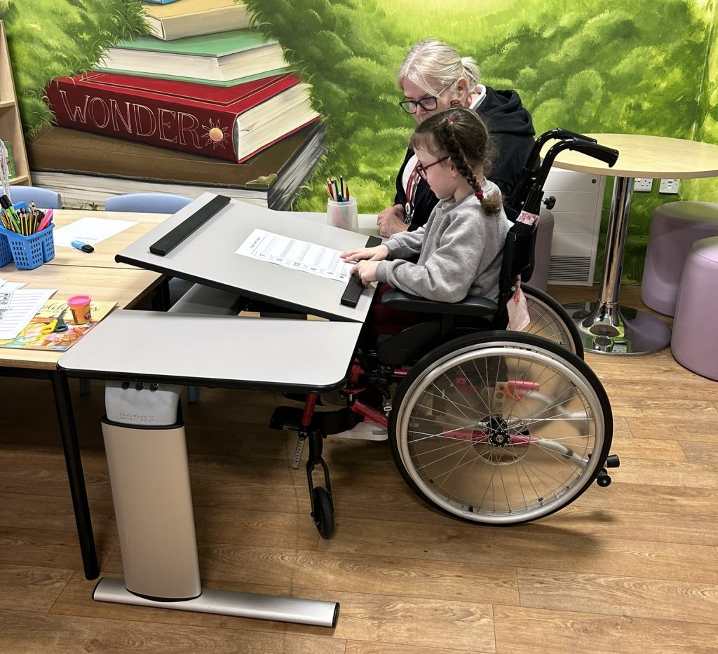 wheelchair user at a ropox vision table