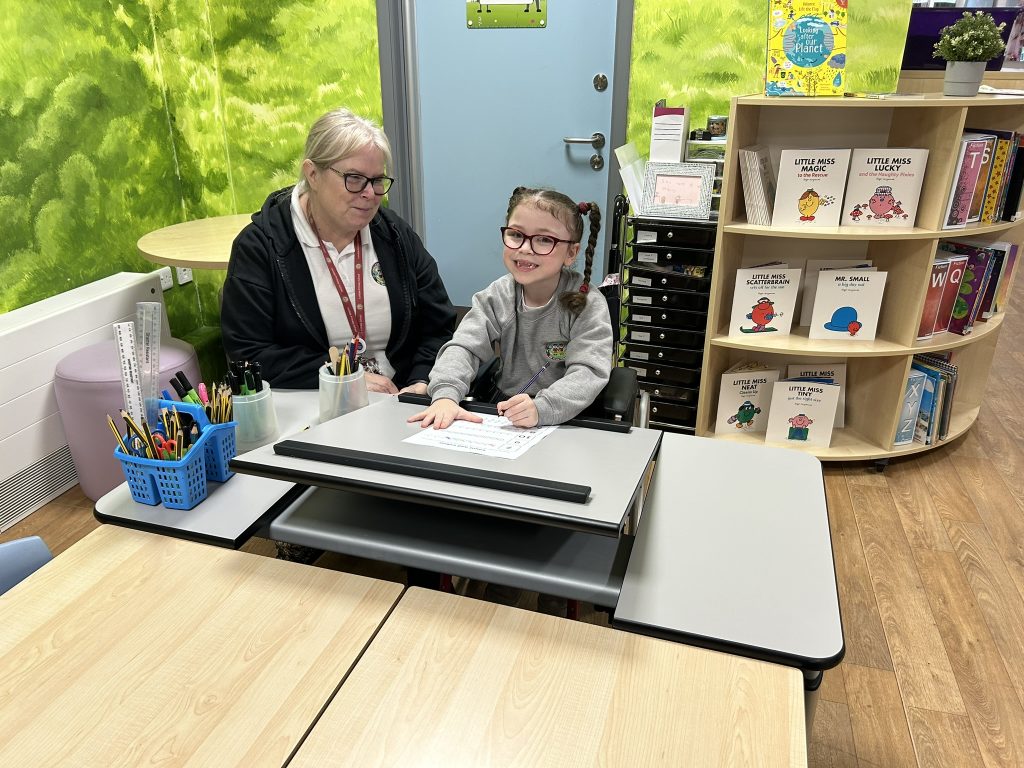 wheelchair user at a ropox vision table